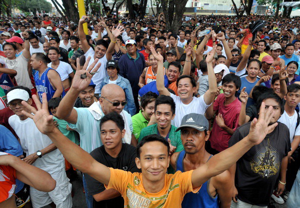 Мэнни Пакьяо одержал победу над Маргарито.  Фото: TOM PENNINGTON, ROBYN BECK /Getty Images