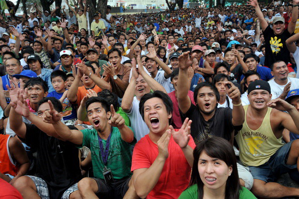Мэнни Пакьяо одержал победу над Маргарито.  Фото: TOM PENNINGTON, ROBYN BECK /Getty Images