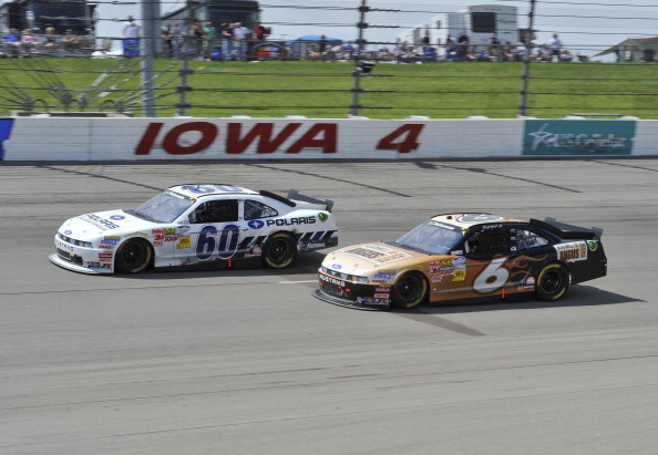 Автомобили Ford и Dodge победили на авторалли NASCAR. Фоторепортаж со скоростной трассы штата Айовы. Фото: Tom Pennington/Getty Images for NASCAR Автомобили Ford и Dodge победили на авторалли NASCAR. Фоторепортаж со скоростной трассы штата Айовы. Фото: Tom Pennington/Getty Images for NASCAR