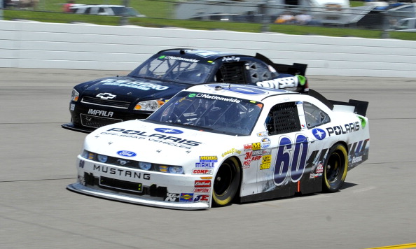Автомобили Ford и Dodge победили на авторалли NASCAR. Фоторепортаж со скоростной трассы штата Айовы. Фото: Tom Pennington/Getty Images for NASCAR Автомобили Ford и Dodge победили на авторалли NASCAR. Фоторепортаж со скоростной трассы штата Айовы. Фото: Tom Pennington/Getty Images for NASCAR