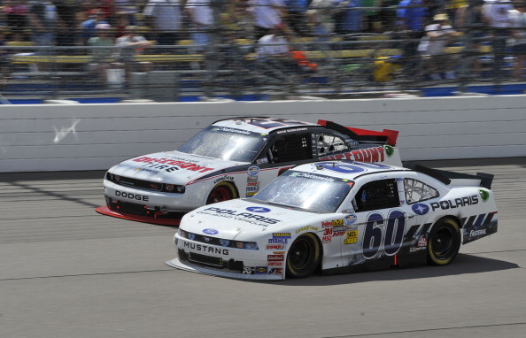 Автомобили Ford и Dodge победили на авторалли NASCAR. Фоторепортаж со скоростной трассы штата Айовы. Фото: Tom Pennington/Getty Images for NASCAR Автомобили Ford и Dodge победили на авторалли NASCAR. Фоторепортаж со скоростной трассы штата Айовы. Фото: Tom Pennington/Getty Images for NASCAR