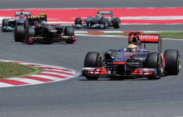 Renault и McLaren в автогонках Формулы-1 заняли призовые места. Фоторепортаж из Барселоны. Фото: Paul Gilham/Vladimir Rys/Mark Thompson/ DIMITAR DILKOFF/AFP/Getty Images Renault и McLaren в автогонках Формулы-1 заняли призовые места. Фоторепортаж из Барселоны. Фото: Paul Gilham/Vladimir Rys/Mark Thompson/ DIMITAR DILKOFF/AFP/Getty Images