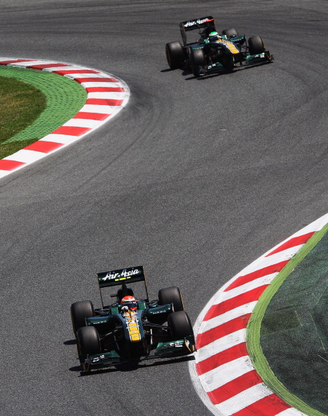 Renault и McLaren в автогонках Формулы-1 заняли призовые места. Фоторепортаж из Барселоны. Фото: Paul Gilham/Vladimir Rys/Mark Thompson/ DIMITAR DILKOFF/AFP/Getty Images Renault и McLaren в автогонках Формулы-1 заняли призовые места. Фоторепортаж из Барселоны. Фото: Paul Gilham/Vladimir Rys/Mark Thompson/ DIMITAR DILKOFF/AFP/Getty Images