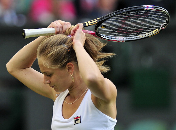 Фоторепортаж с матча: Мария Шарапова  выиграла у Анны Чакветадзе. Фото: Clive Brunskill /Michael Regan/ GLYN KIRK/AFP/Getty Images