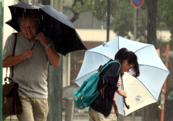 Фоторепортаж о наводнение в Японии, вызванного тайфуном «Талас». Фото: Buddhika Weerasinghe / Getty Images Фоторепортаж о наводнение в Японии, вызванного тайфуном «Талас». Фото: Buddhika Weerasinghe / Getty Images