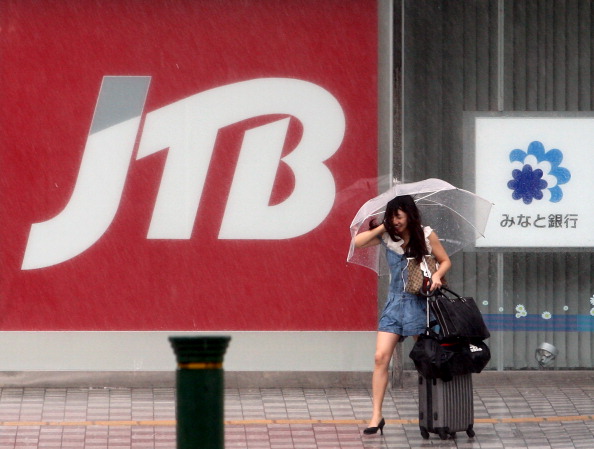 Фоторепортаж о наводнение в Японии, вызванного тайфуном «Талас». Фото: Buddhika Weerasinghe / Getty Images Фоторепортаж о наводнение в Японии, вызванного тайфуном «Талас». Фото: Buddhika Weerasinghe / Getty Images