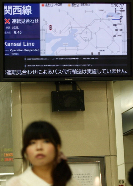 Фоторепортаж о наводнение в Японии, вызванного тайфуном «Талас». Фото: Buddhika Weerasinghe / Getty Images Фоторепортаж о наводнение в Японии, вызванного тайфуном «Талас». Фото: Buddhika Weerasinghe / Getty Images