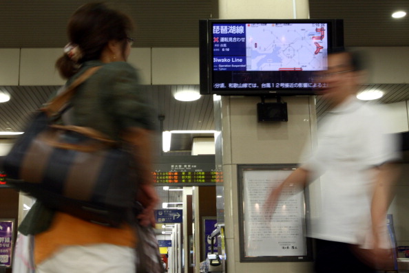 Фоторепортаж о наводнение в Японии, вызванного тайфуном «Талас». Фото: Buddhika Weerasinghe / Getty Images Фоторепортаж о наводнение в Японии, вызванного тайфуном «Талас». Фото: Buddhika Weerasinghe / Getty Images