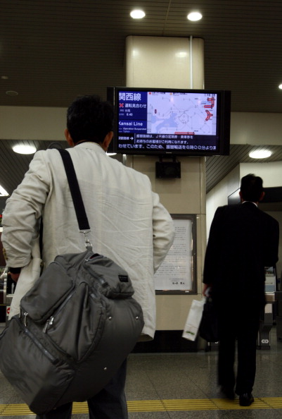 Фоторепортаж о наводнение в Японии, вызванного тайфуном «Талас». Фото: Buddhika Weerasinghe / Getty Images Фоторепортаж о наводнение в Японии, вызванного тайфуном «Талас». Фото: Buddhika Weerasinghe / Getty Images