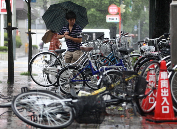 Фоторепортаж о наводнение в Японии, вызванного тайфуном «Талас». Фото: Buddhika Weerasinghe / Getty Images Фоторепортаж о наводнение в Японии, вызванного тайфуном «Талас». Фото: Buddhika Weerasinghe / Getty Images