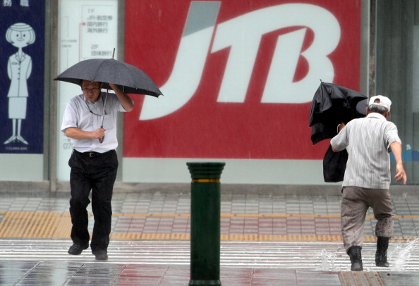 Фоторепортаж о наводнение в Японии, вызванного тайфуном «Талас». Фото: Buddhika Weerasinghe / Getty Images Фоторепортаж о наводнение в Японии, вызванного тайфуном «Талас». Фото: Buddhika Weerasinghe / Getty Images