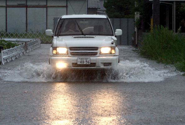 Фоторепортаж о наводнение в Японии, вызванного тайфуном «Талас». Фото: Buddhika Weerasinghe / Getty Images Фоторепортаж о наводнение в Японии, вызванного тайфуном «Талас». Фото: Buddhika Weerasinghe / Getty Images