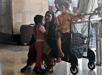 Сегодня международный день иммигрантов. Фото:  RIZWAN TABASSUM/AFP/Getty Images