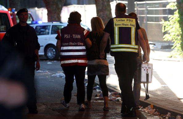 В Германии на  &laquo;Параде любви&raquo; в давке погибло более десяти человек. Фоторепортаж. Фото: Patrik STOLLARZ, Sebastian LASSE, Christoph REICHWEIN, ACHIM SCHEIDEMANN/Getty Images