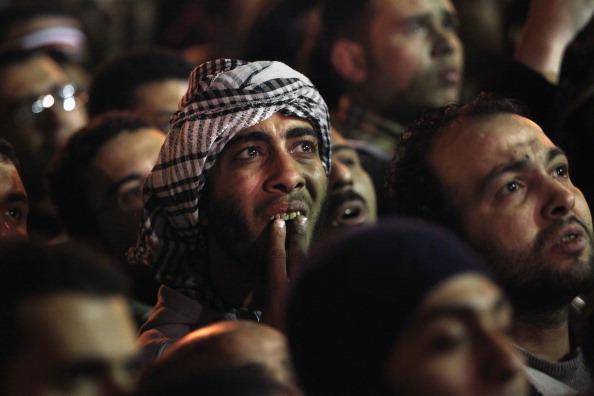 Хосни Мубарак остаётся у власти, отказавшись от части полномочий. Фоторепортаж. Фото: John Moore/Getty Images Хосни Мубарак остаётся у власти, отказавшись от части полномочий. Фоторепортаж. Фото: John Moore/Getty Images