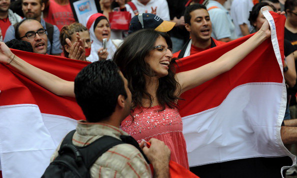 Хосни Мубарак покинул пост главы Египта. Фоторепортаж. Фото: PEDRO UGARTE, GREG WOOD,  /AFP/Getty Images