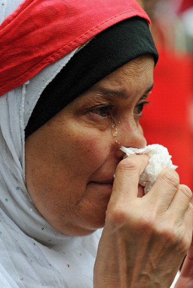 Хосни Мубарак покинул пост главы Египта. Фоторепортаж. Фото: PEDRO UGARTE, GREG WOOD,  /AFP/Getty Images