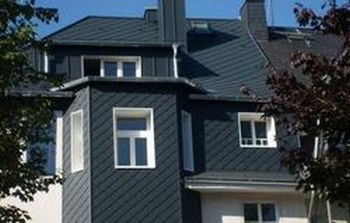 Металлочерепица QVADRO. Фото с сайта www.centerkrovel.ru