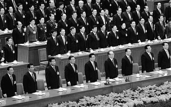 BEIJING - OCTOBER 21: (L-R: front row) Chinese leaders Luo Gan, Wu Guanzheng, Jia Qinglin, Wu Bangguo, Hu Jintao, Jiang Zemin, Wen Jiabao, Zeng Qinghong and Li Changchun attend the 17th Chinese Communist Party Congresson at the Great Hall of the People on October 21, 2007 in Beijing, China. The Communist Party wrapped up its five-yearly congress on October 21 with leadership changes and President Hu Jintao's vision for China written into its charter. (Photo by Guang Niu/Getty Images)