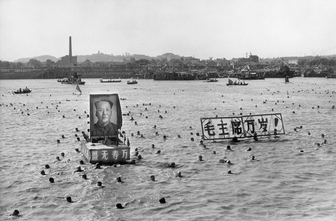 A picture released by the Chinese official news agency shows some 5,000 Chinese following Chairman Mao Zedong's example swimming 02 September 1967, in the Yangtze river, near Wuhan, displaying floating portraits of the Great Helmsman and slogans calling for him a "10,000 year" life. Right after swimming in the Yangtze river, Mao went back to Beijing to head the Great Proletarian Cultural Revolution against his former comrade Lin Piao and Deng Xiaoping, bringing Red China close to a civil war. CHINA OUT AFP PHOTO/XINHUA (Photo credit should read STR/AFP/Getty Images)