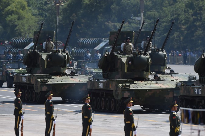 Крадущийся тигр: Китай на тропе войны Военный парад на площади Тяньаньмэнь в Пекине, 3 сентября 2015 г. Фото: Greg Baker/AFP/Getty Images