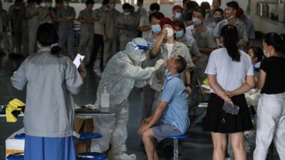 Массовое тестирование на COVID-19 в Китае приводит к новым заражениям