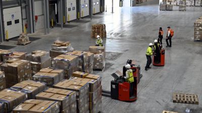 Открытие платформы Cainiao, логистического подразделения Alibaba, 8 ноября 2021 года, в аэропорту Льежа в Грейс-Холлонь. Фото: ERIC LALMAND/BELGA MAG/AFP via Getty Images)